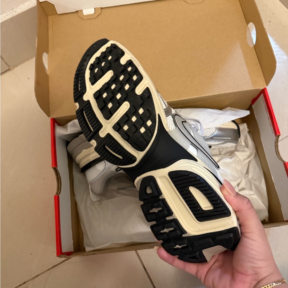 Nike grey and white tennis shoes, new and unused